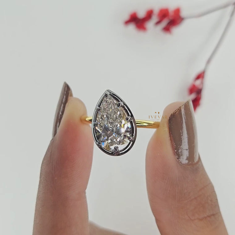 Black Bezel Pear Cut Solitaire Engagement Ring video