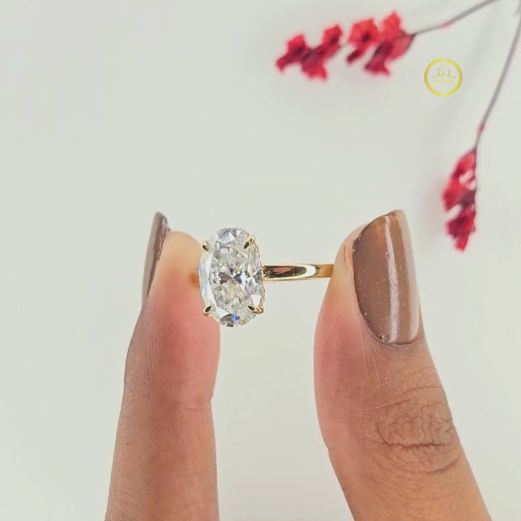 Oval Cut Four Prong Solitaire Ring with Plain Band video
