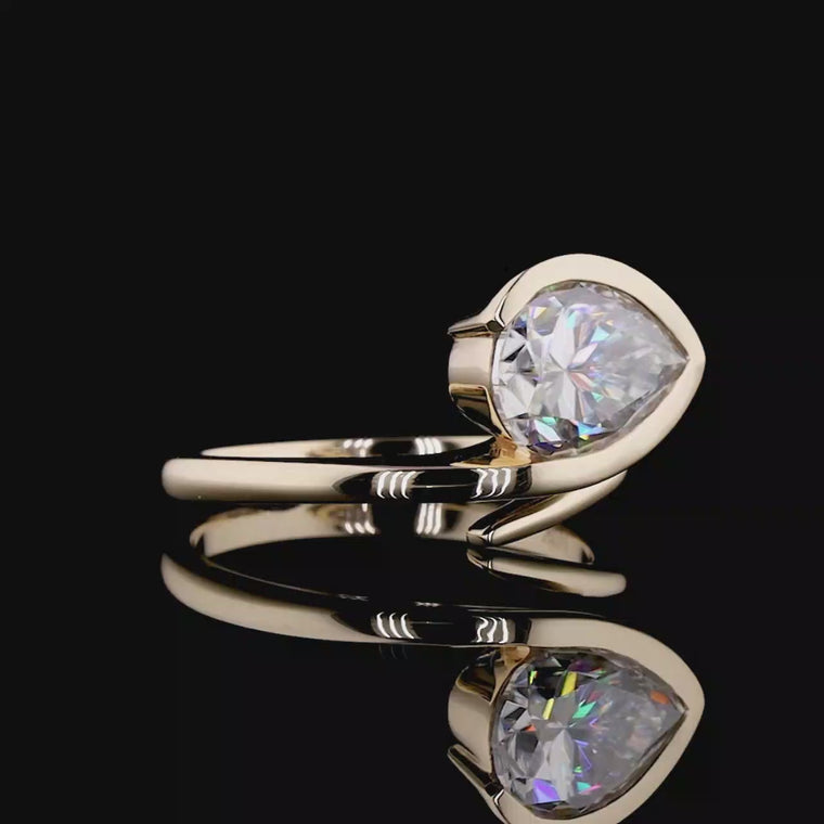 Pear Cut Bypass Solitaire Ring video