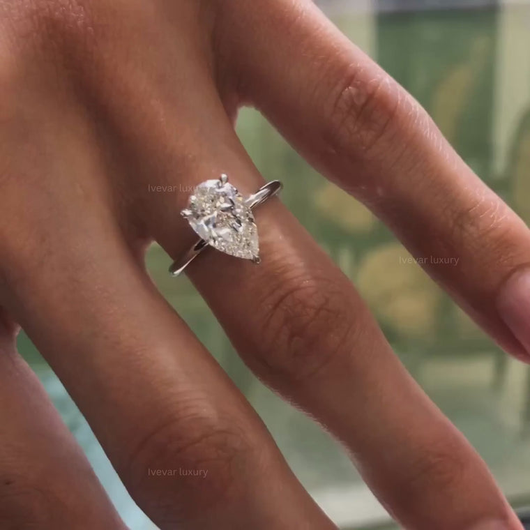 Pear Cut Solitaire Delicate Wear Engagement Ring video