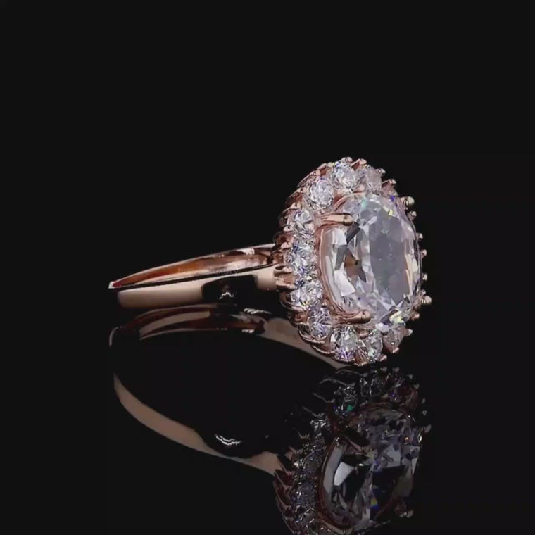 Fancy Intense Pink Oval Cut Floral Halo Ring video