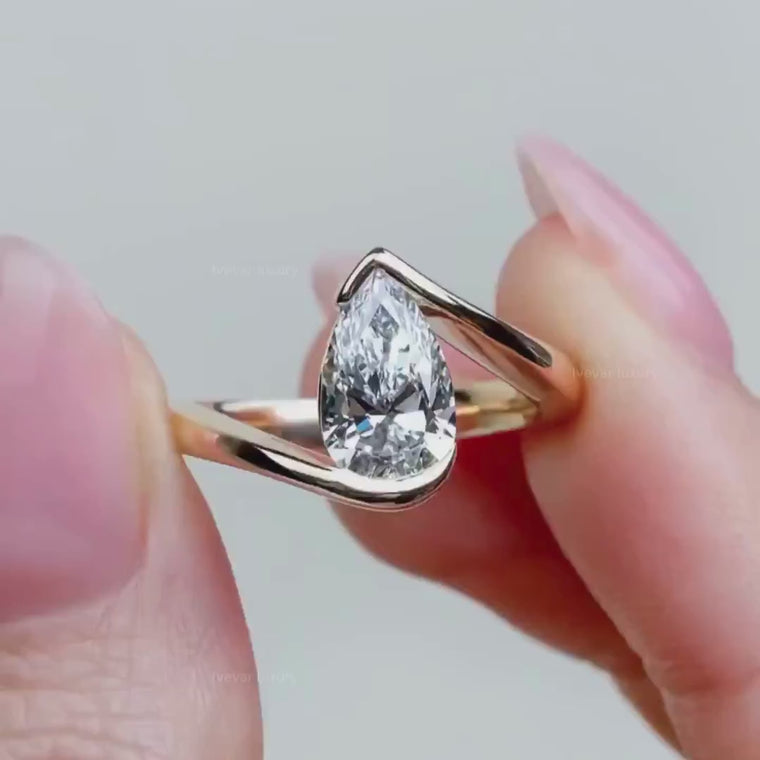 Antique Style Pear Cut Bypass Solitaire Ring video