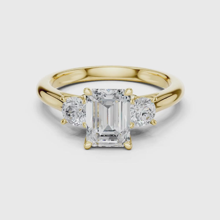 Emerald Cut Moissanite Ring with Round Side Stones video