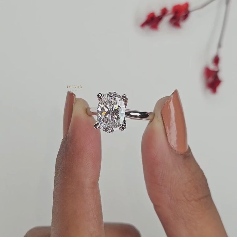 Oval Cut Four Prong Solitaire Engagement Ring video