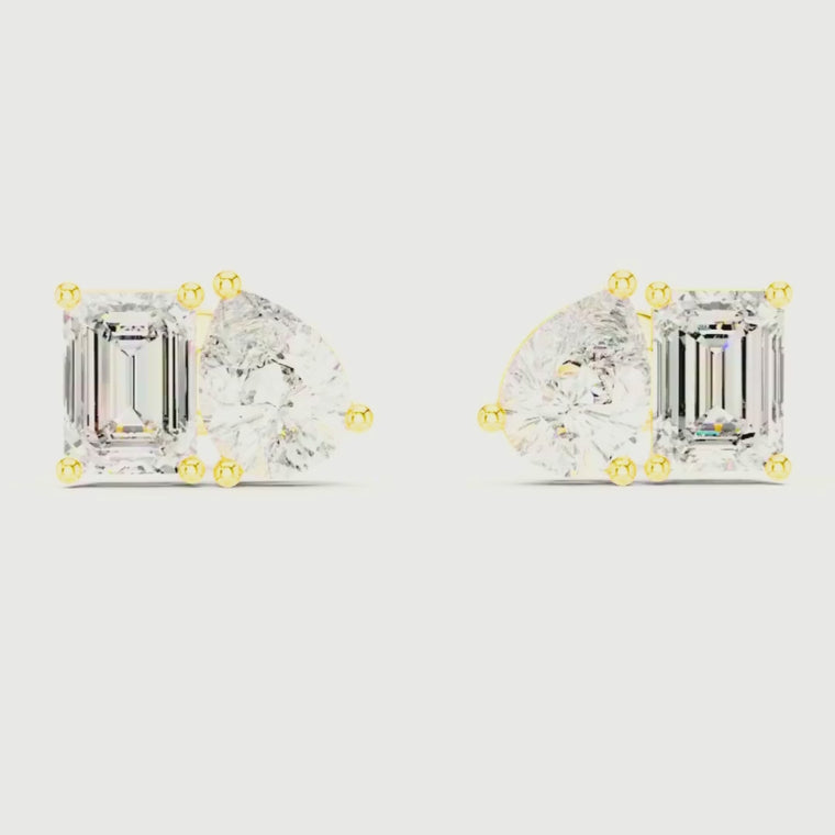 Modern Stud Earrings Featuring Emerald Cut and Pear Cut Duo video
