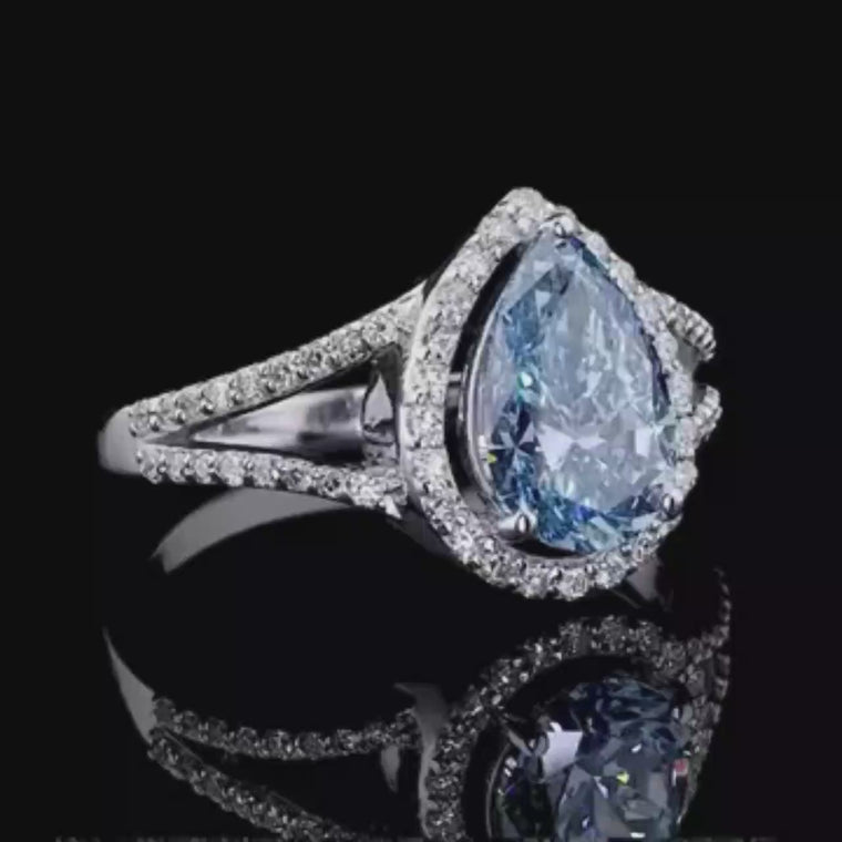 Fancy Intense Blue Pear Cut Halo Split Shank Ring video