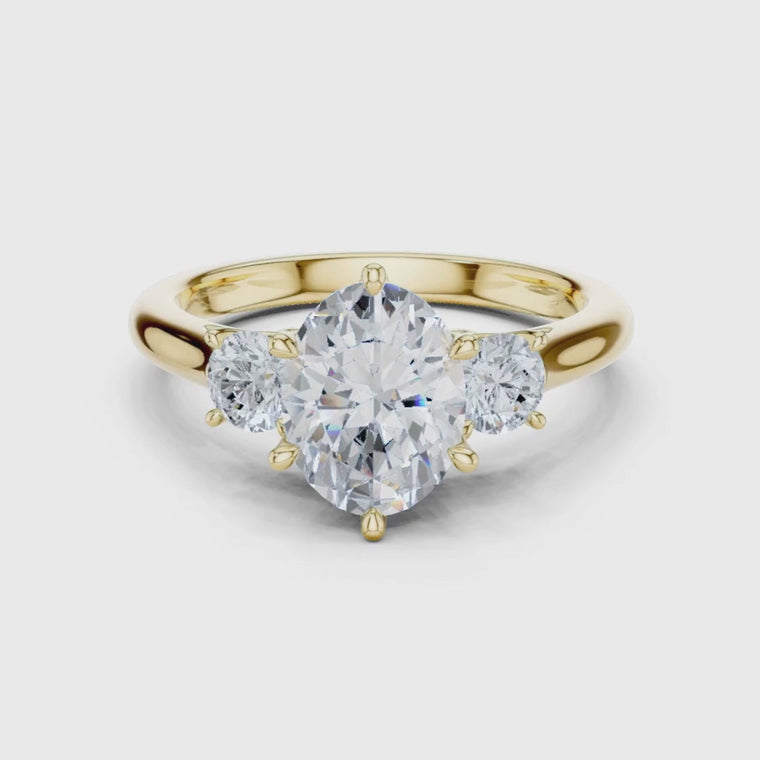 Oval Cut Ring with Round Side Stones video