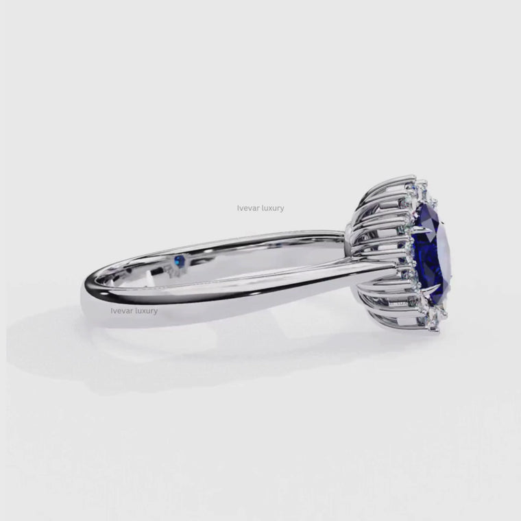 Fancy Vivid Blue Oval Ring With Halo Slim Band video