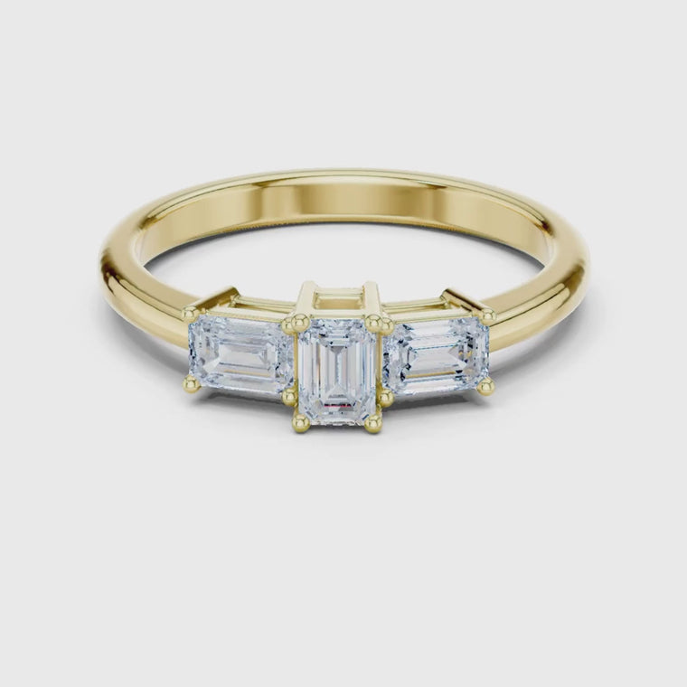 Emerald Cut Three Stone Ring with Baguette Side Stones video