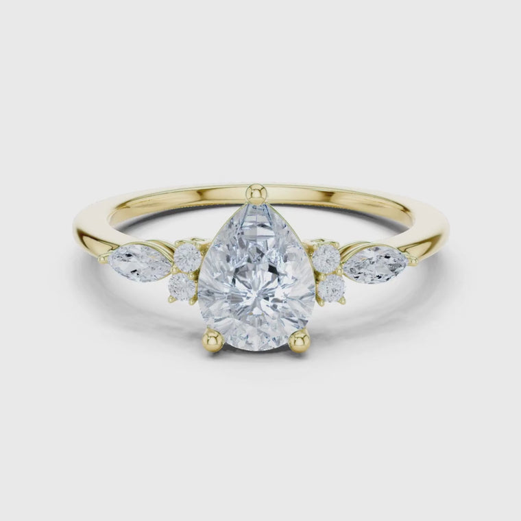 Pear Cut Engagement Ring With Sidestone video