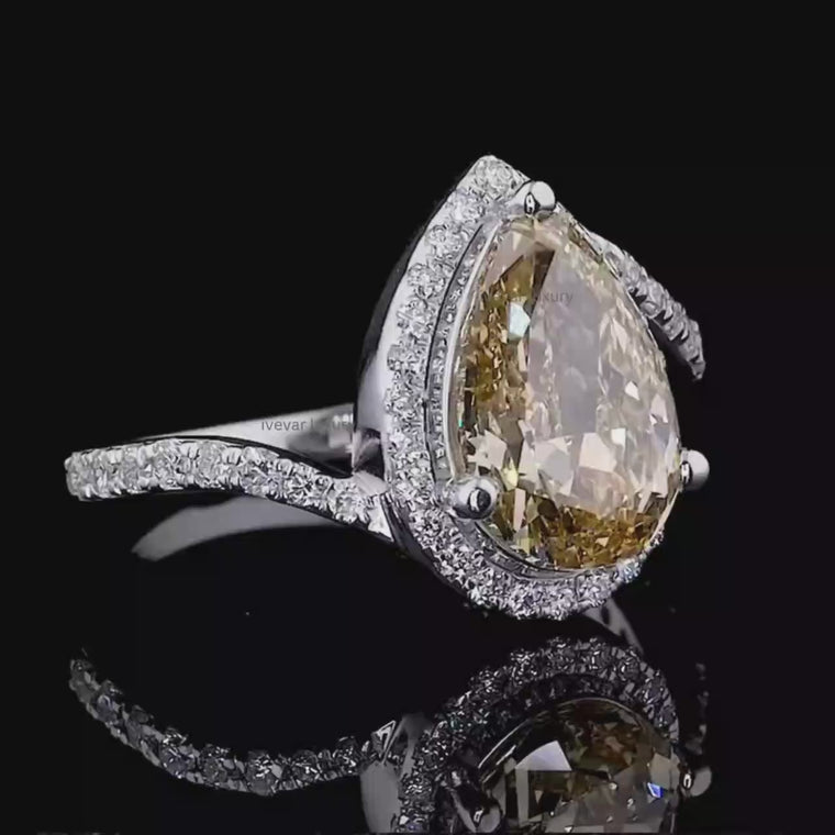 Fancy Vivid Yellow Pear Halo Ring with Wedding Band video