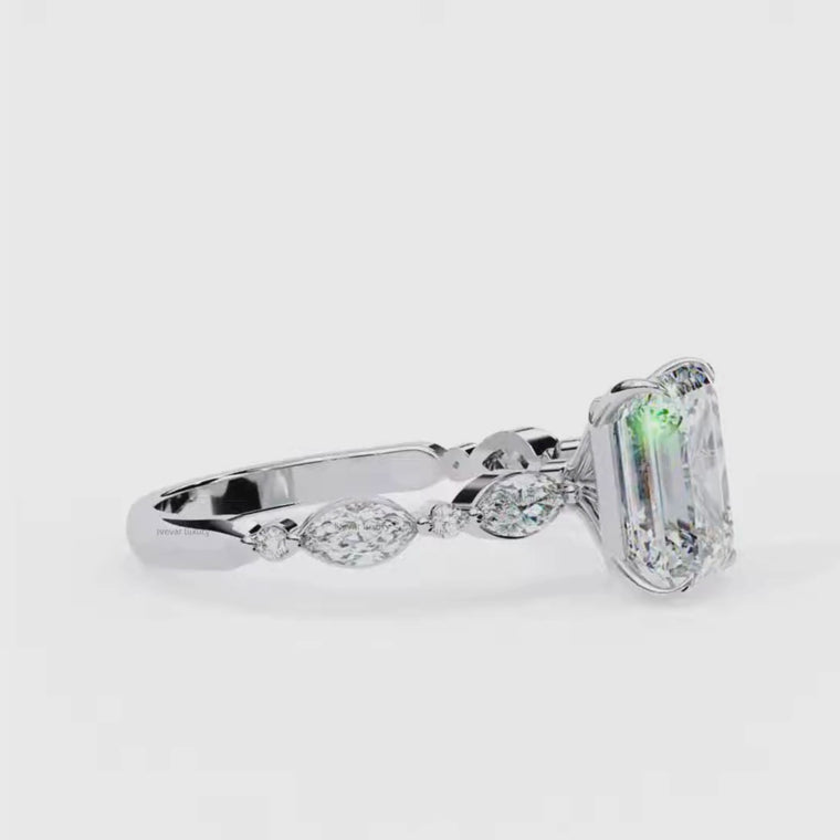 Emerald Engagement Ring With Marquise And Round Side Stones video