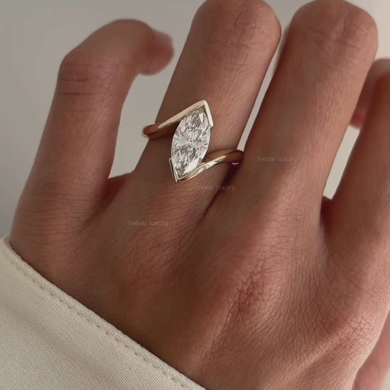 Marquise Solitaire Bypass Half Bezel Promise Ring video