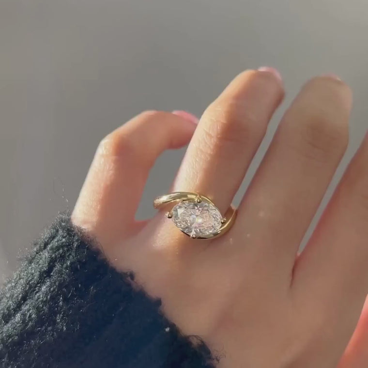 Oval Solitaire Ring With Sculptural Bypass Band video