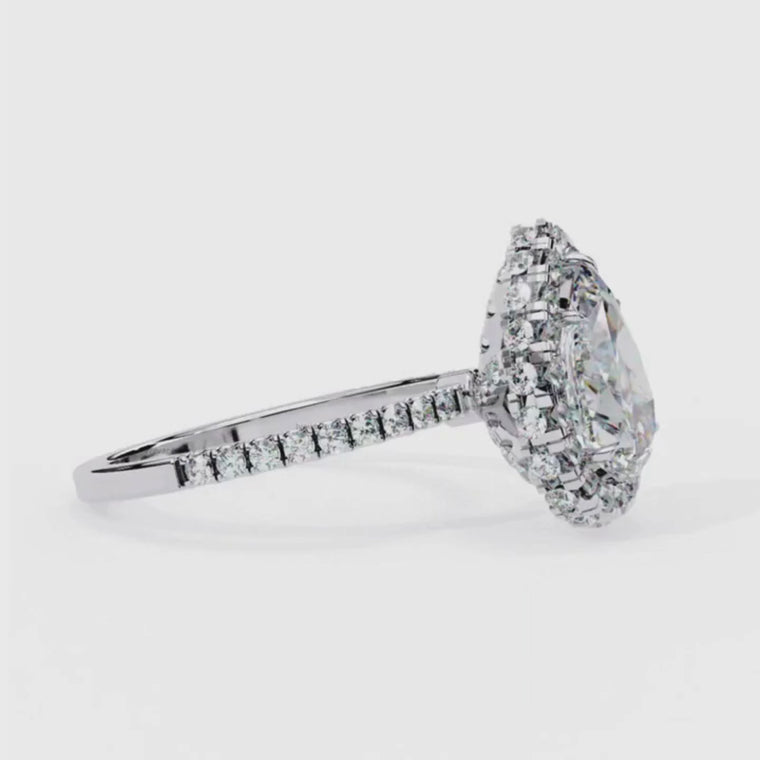 Pear Cut Halo Ring with Studded Band video