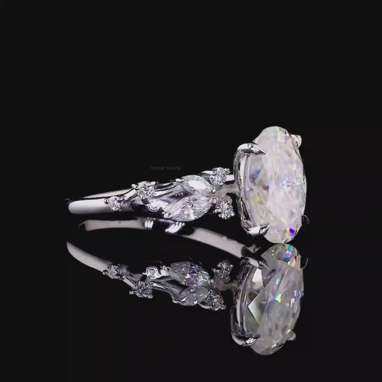 Oval Cut Engagement Ring With Marquise Cluster Side Stones video
