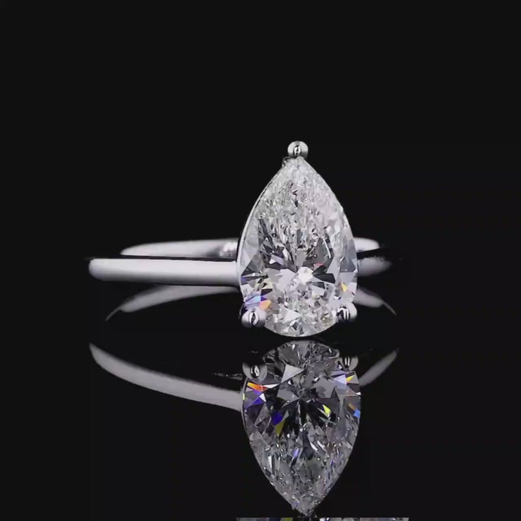 Pear Cut Cathedral Solitaire Engagement Ring With Slim Band video