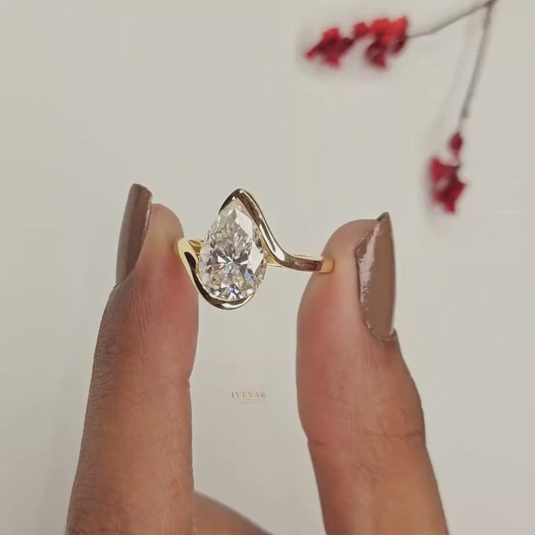 Pear Cut Bypass Ring in Half Bezel Setting video
