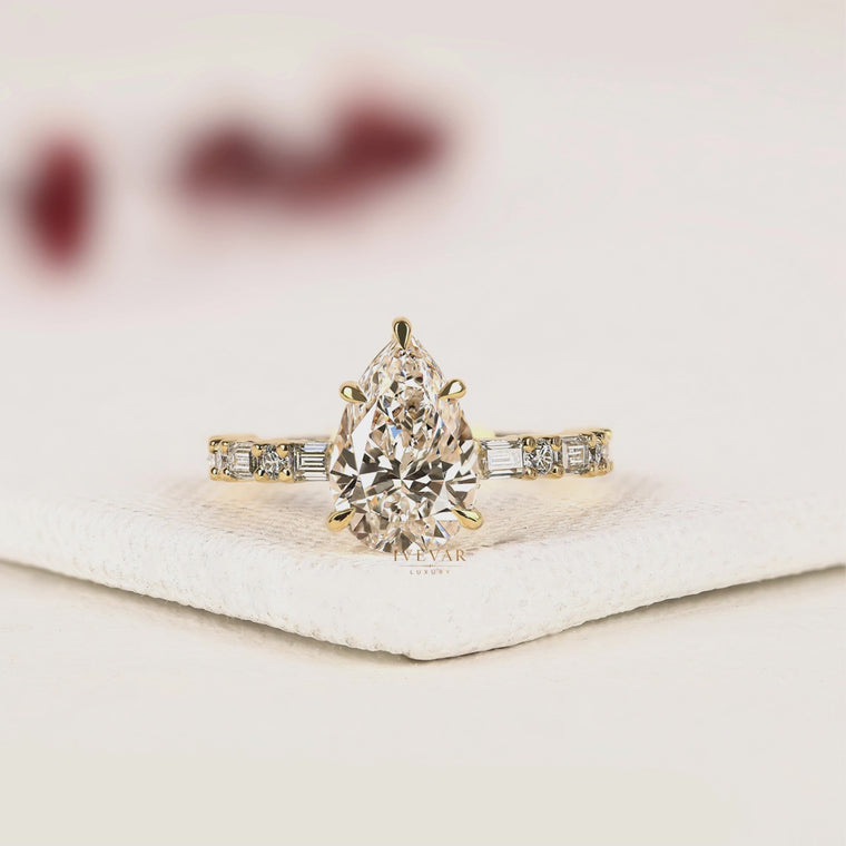 Pear Cut Engagement Ring with Baguette Accent Band video