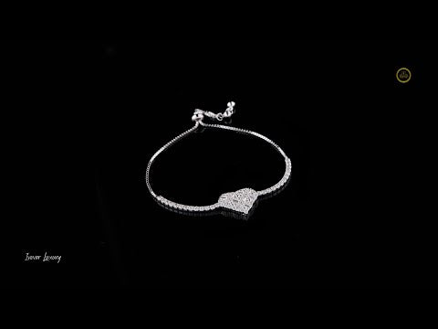 0.80 TCW Elegant Silver Heart shaped Bracelet with Dazzling Baguette and Round Lab Grown Diamonds