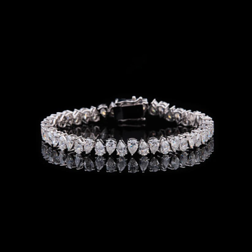 12 TCW Exquisite Pear Shaped Moissanite Diamond Cascade Tennis Bracelet in Lustrous Gold By Ivevar