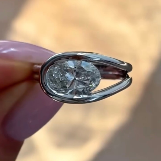 1.55 TCW Contemporary Oval Cut Moissanite Diamond Ring in Bezel Set A Statement of Luxury