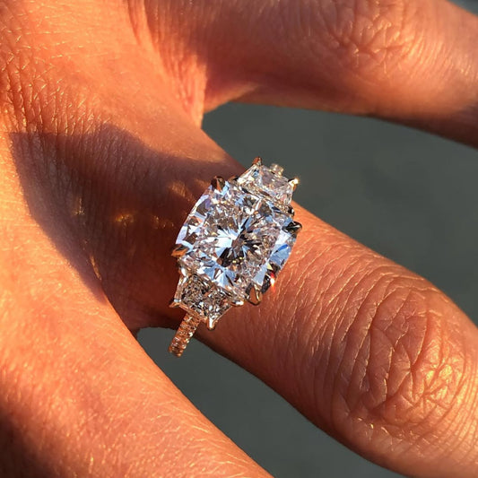 3.00 CT Statement Cushion Cut Moissanite Diamond Ring with Sculpted Trapezoid Side Stones and Pave Set Gold Band