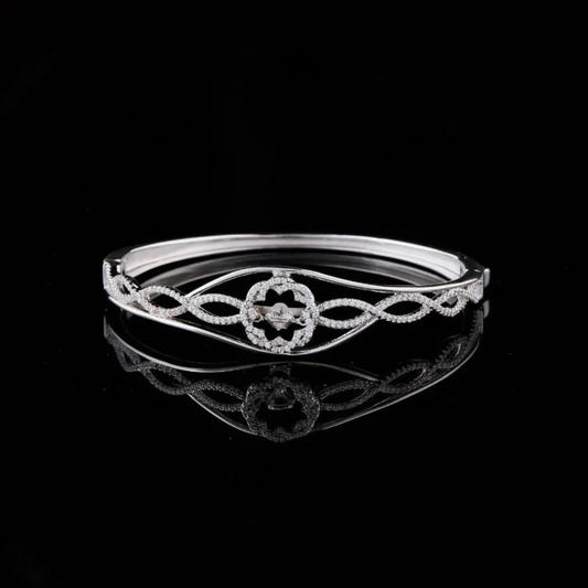 1.10 TCW Luxury Twisted Design Moissanite Bracelet Featuring a Central Radiant Flower and Pave Detailing