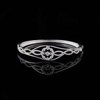3.5 TCW Luxury Twisted Design Lab Grown Bracelet Featuring a Central Radiant Flower and Pave Detailing By Ivevar