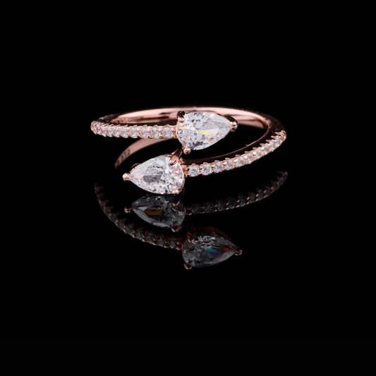 1.00 CT Sparkling Rose Gold Moissanite Diamond Ring with Twin Pear-Shaped Sparkling Stones and Pave Diamond Band