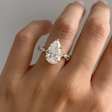 3.00 CT Refined Pear Shape Solitaire Ring with Sculpted Moissanite Diamond Band in Gold
