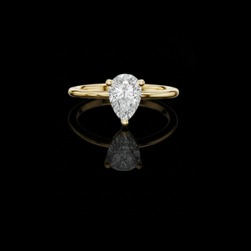 0.90 TCW Luxurious Pear Shaped Moissanite Diamond Solitaire Ring in Classic Gold